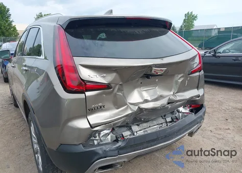 2020 Cadillac Xt4 Awd Premium Luxury from USA, damaged, VIN 1GYFZDR46LF079151